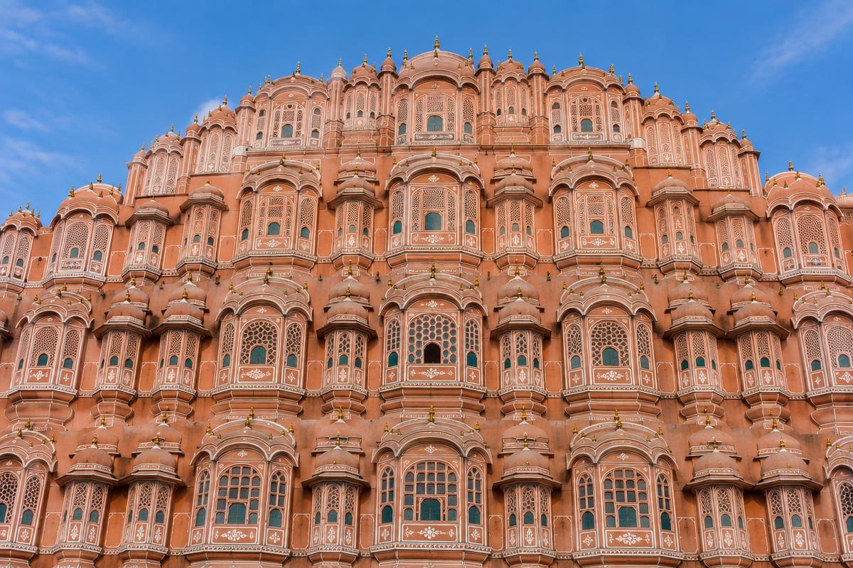 Historic pink sandstone Hawa Mahal in Jaipur during daylight